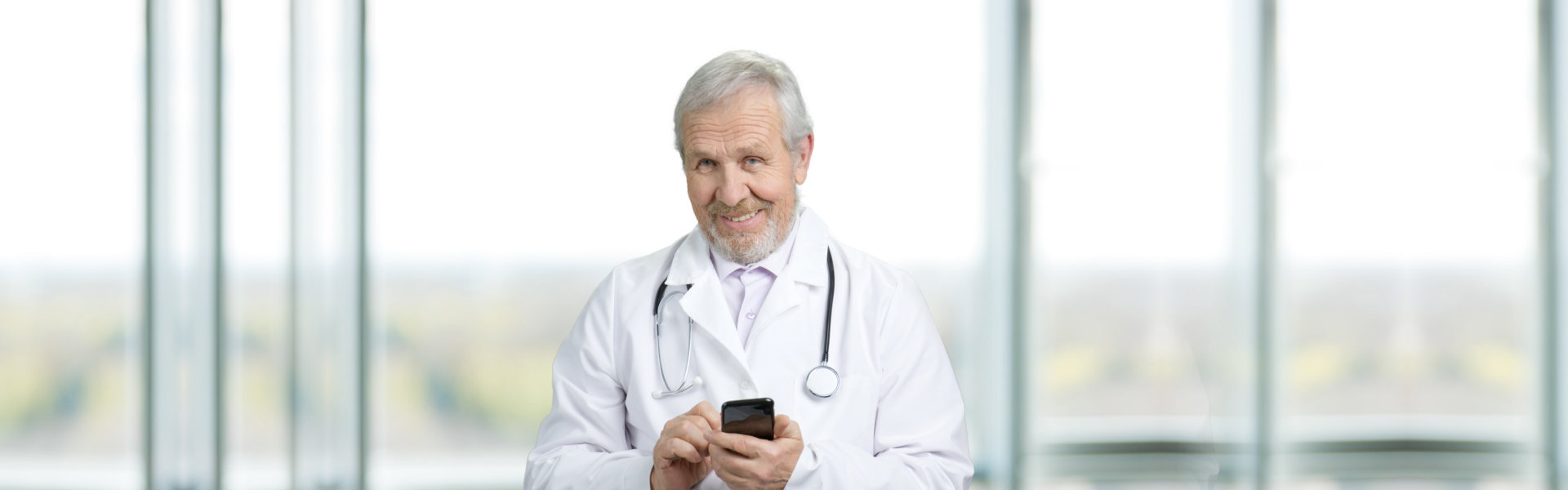 doctor holding cellphone