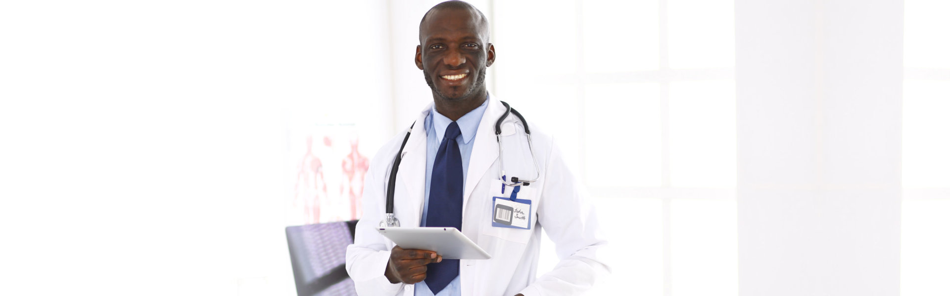 doctor holding tablet